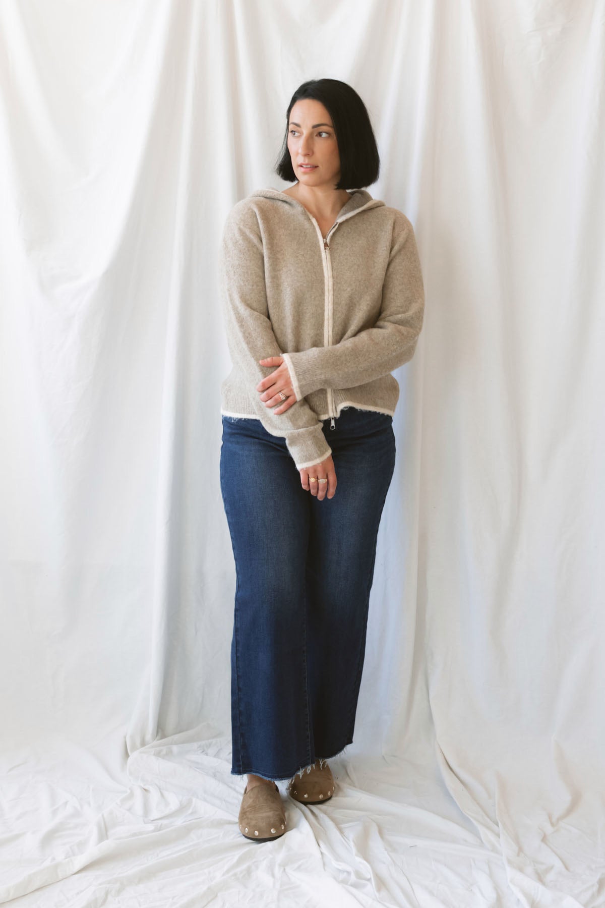 Ginger mocha knit hooded cardigan with contrast trim, long sleeves, and a front zip closure.