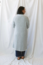 Kaitlyn heather grey knit open cardigan with a lapel collar and contrast trim.
