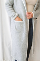 Kaitlyn heather grey knit open cardigan with a lapel collar and contrast trim.
