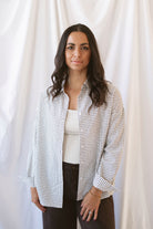 Eloise oversized black and ivory check shirt with a relaxed button-front silhouette.