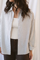 Eloise oversized black and ivory check shirt with a relaxed button-front silhouette.