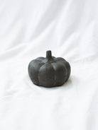 Smallest size of the 3 styles sitting on a white linen backdrop. 